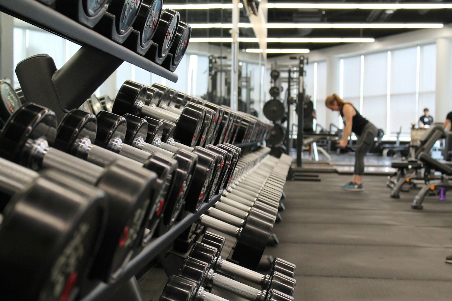 Dumbbells in a bright training studio